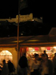 Hohensalzburg Fortress above and Oktoberfest Tent